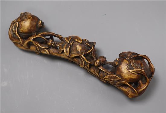 A Chinese carved wood sceptre length 35cm